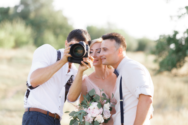 Brautpaar und Fotograf